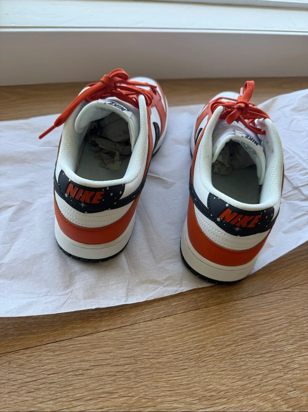 Nike Dunk Low-Top Sneakers in White, Orange & Black.